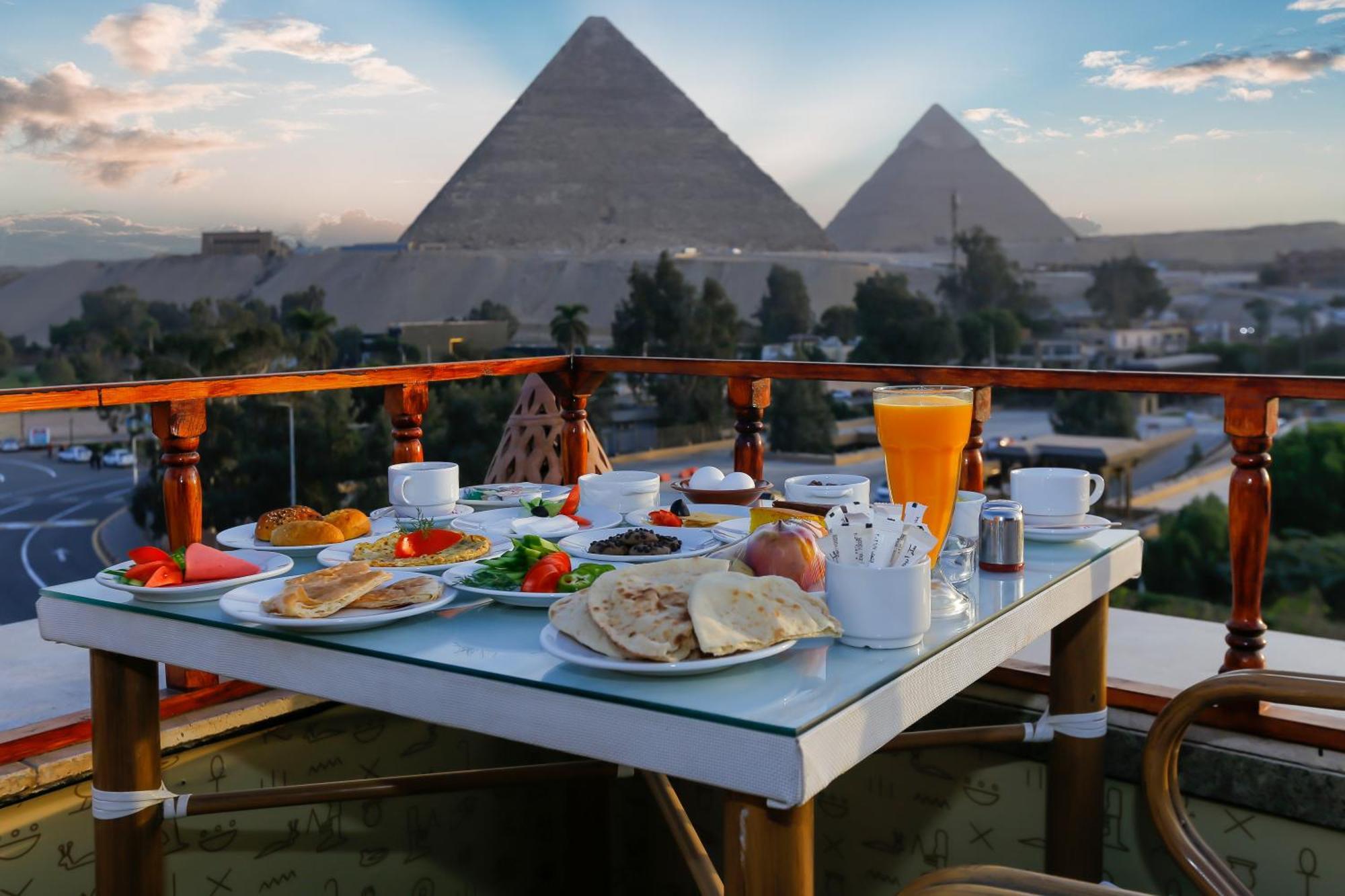Turquoise Pyramids & Grand Egyptian Museum View Отель Kafrat al Jabal